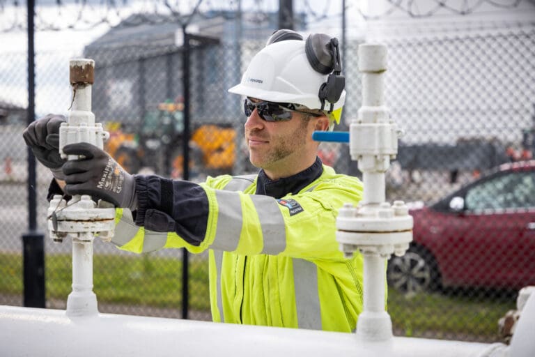 A Penspen engineer inspecting a gas pipeline